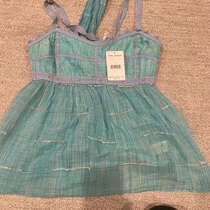 NWT NEVER WORN free people babydoll blouse. ties in the back. open back